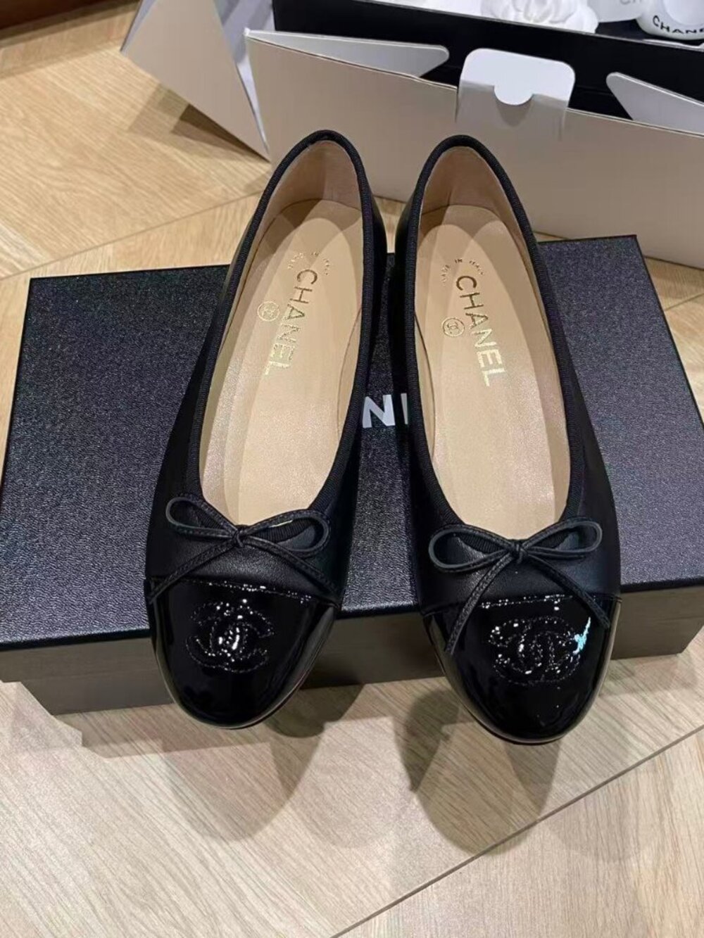 Chanel Black Leather Patent Cap Toe CC Bow Ballet Flats